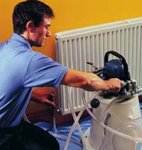 image of a man who attaches a cleansing machine