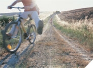 Image of a man riding a bike