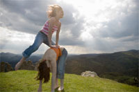 ‘image of two people playing leap-frog, which represents the option flexible finance with British Gas. ‘image of two people playing leap-frog, which represents the option flexible finance with British Gas.
