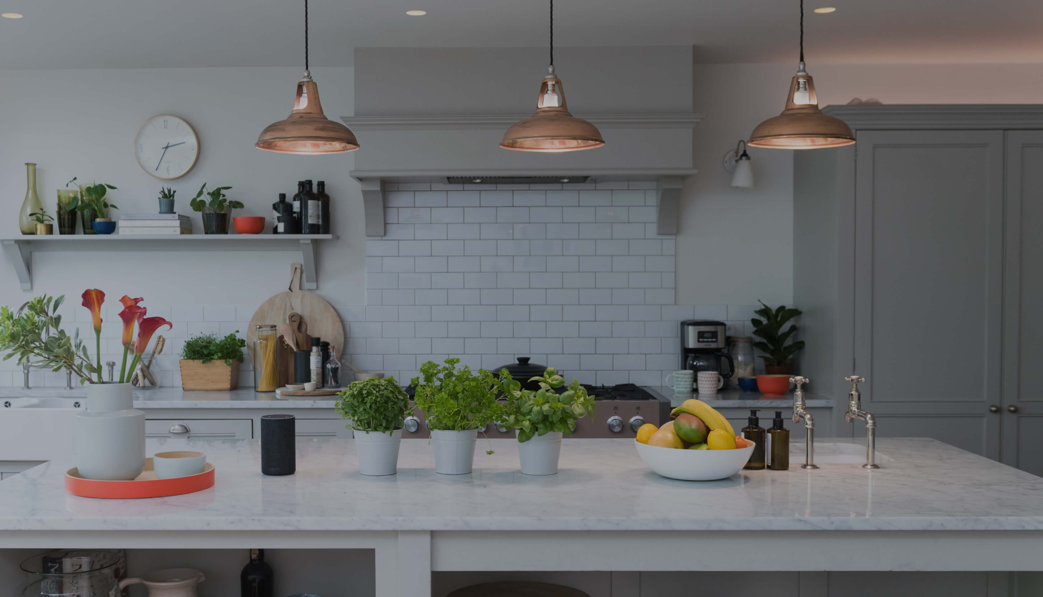 A large home kitchen with Hive spotlights lighting the room