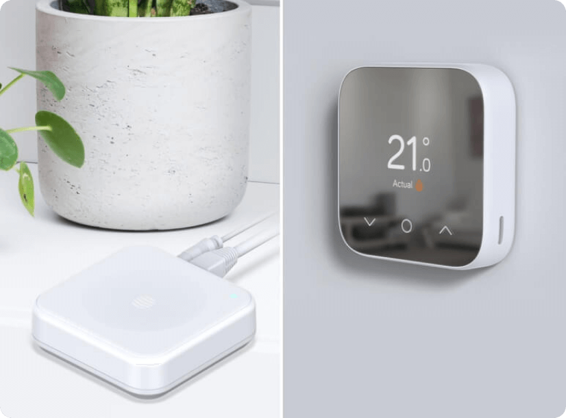 A Hive Hub and Hive Thermostat Mini in use inside a smart home.